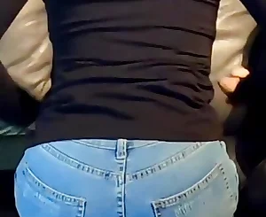 sitting on the bed getting well-prepped cock-squeezing denim