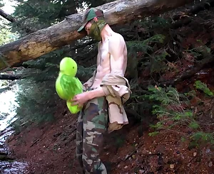 Soldier Tearing up Plushie In The Rocky Mountain Woods During Winter In Dark Canyon Encircled By Fallen Trees. 11 Min